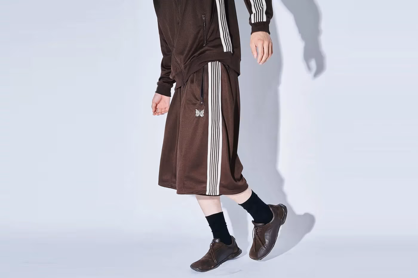 NEEDLES et STUDIOUS réinventent le sportswear estival avec une nouvelle capsule Poly Smooth